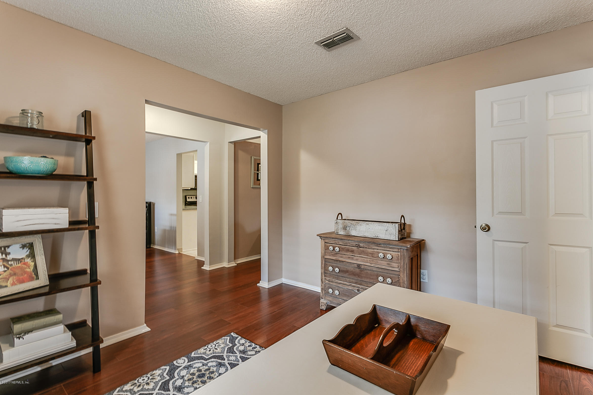 1270 Cutlass Road Orange Park, FL 32065 - Photo 5 of 28 a living room with furniture and a wooden floor