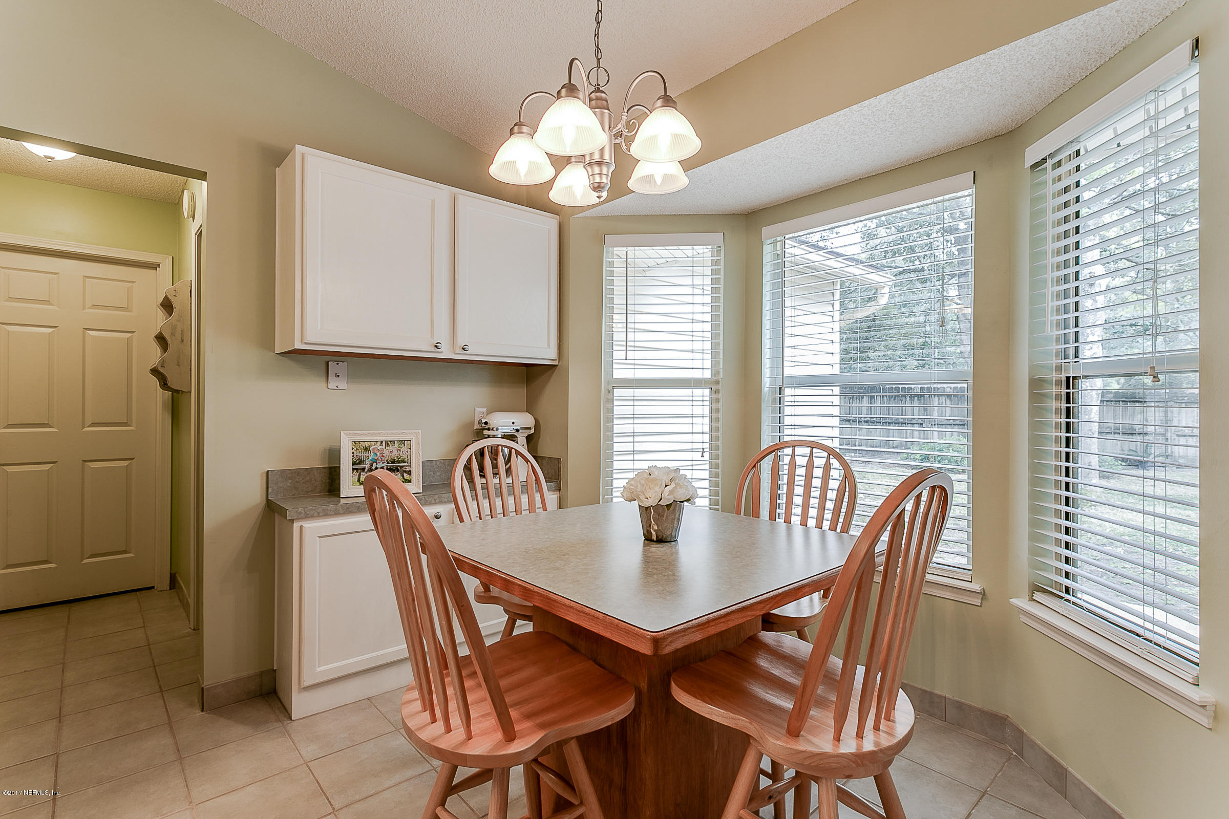1270 Cutlass Road Orange Park, FL 32065 - Photo 10 of 28 a dining room with furniture and window