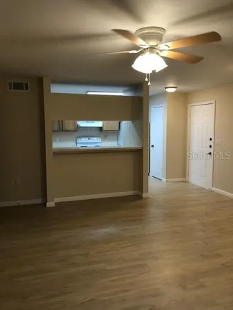 a view of kitchen and a window