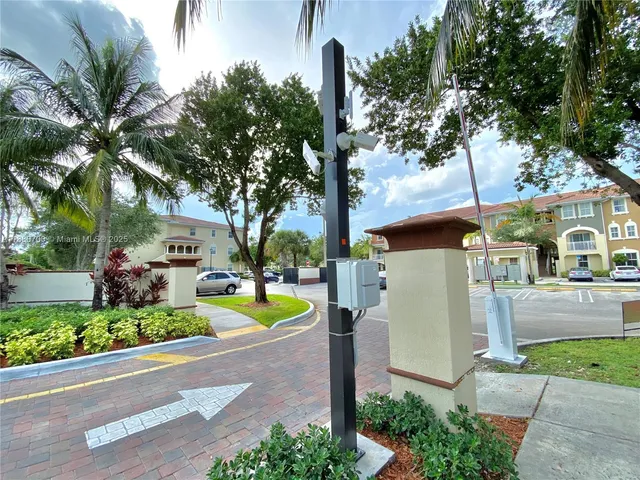 a view of swimming pool with seating space