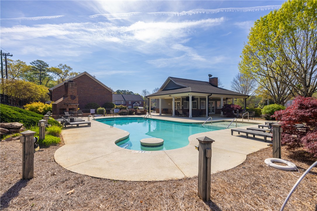 209 Calhoun Street, Unit 201 Clemson, SC 29631 - Photo 30 of 35 This inviting outdoor oasis features a refreshing pool, perfect for relaxation and recreation.