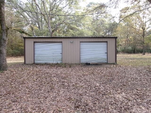 9603 Rosalie Loop Keithville, LA 71047 - Photo 4 of 14 a house with a outdoor space