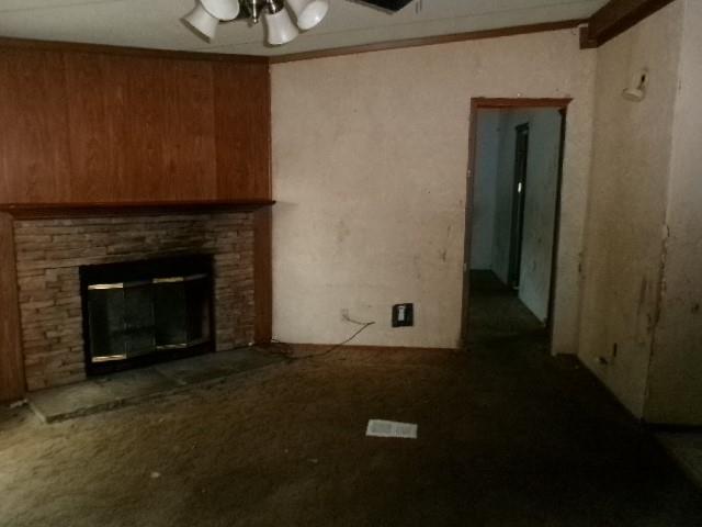 9603 Rosalie Loop Keithville, LA 71047 - Photo 6 of 14 a view of empty room with a fireplace