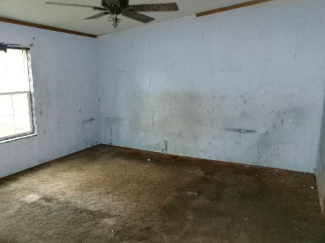 9603 Rosalie Loop Keithville, LA 71047 - Photo 8 of 14 an empty room with a window