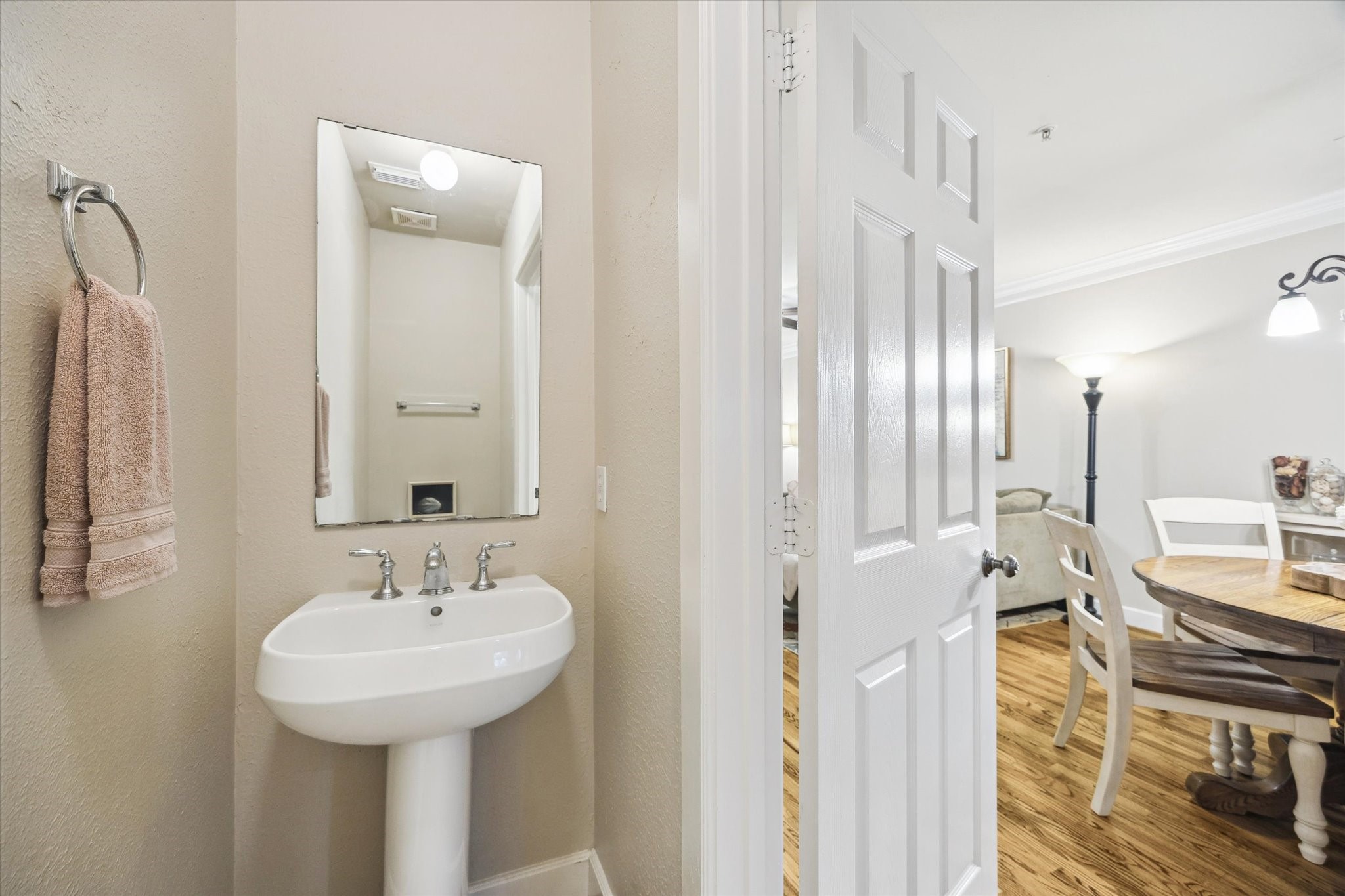 1342 Rutland Street, Unit 203 Houston, TX 77008 - Photo 12 of 20 a bathroom with a sink a mirror and a shower