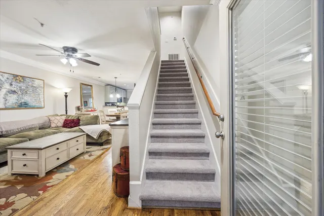 a view of a living room and entryway
