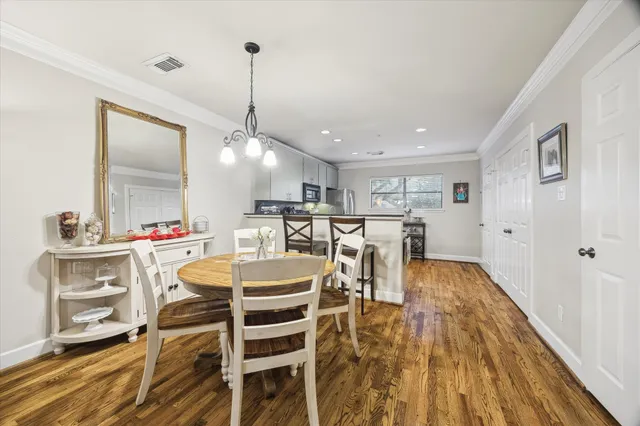 a view of a dining room with furniture