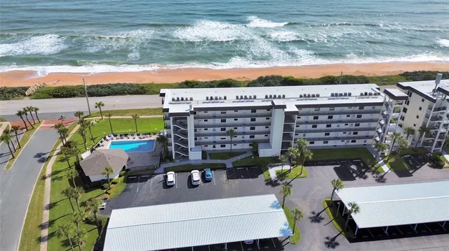 a view of swimming pool with outdoor seating