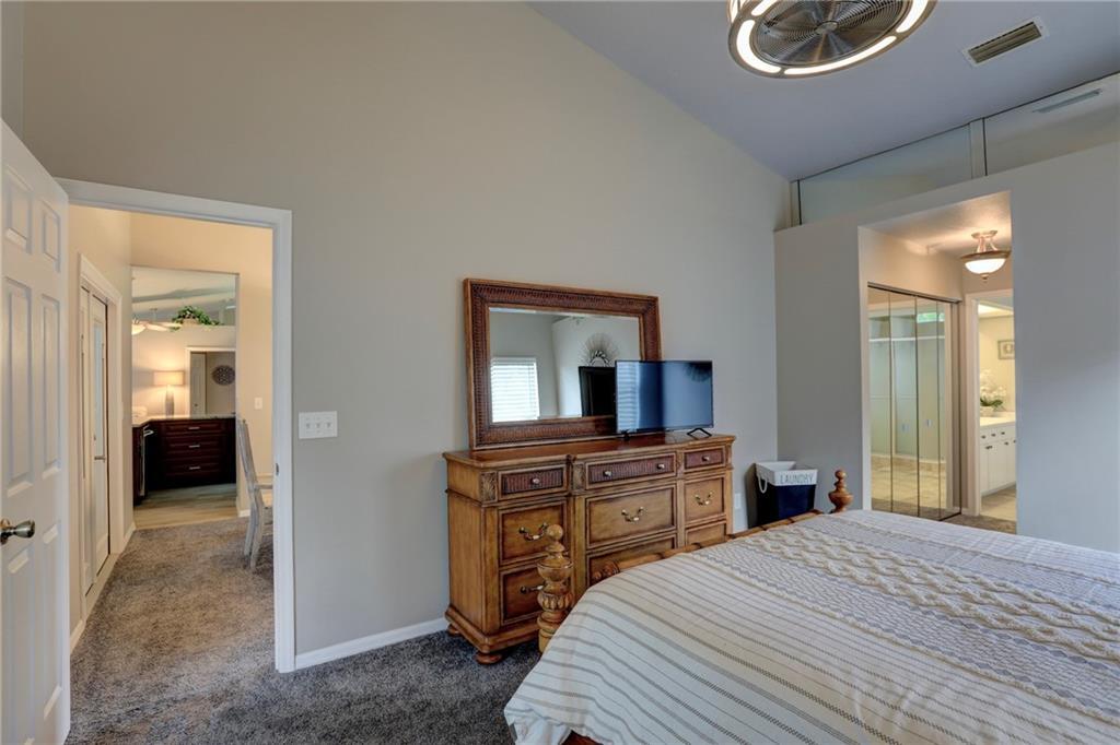 562 Rolling Hill Drive Sebastian, FL 32958 - Photo 20 of 42 a bedroom with a bed and a dresser