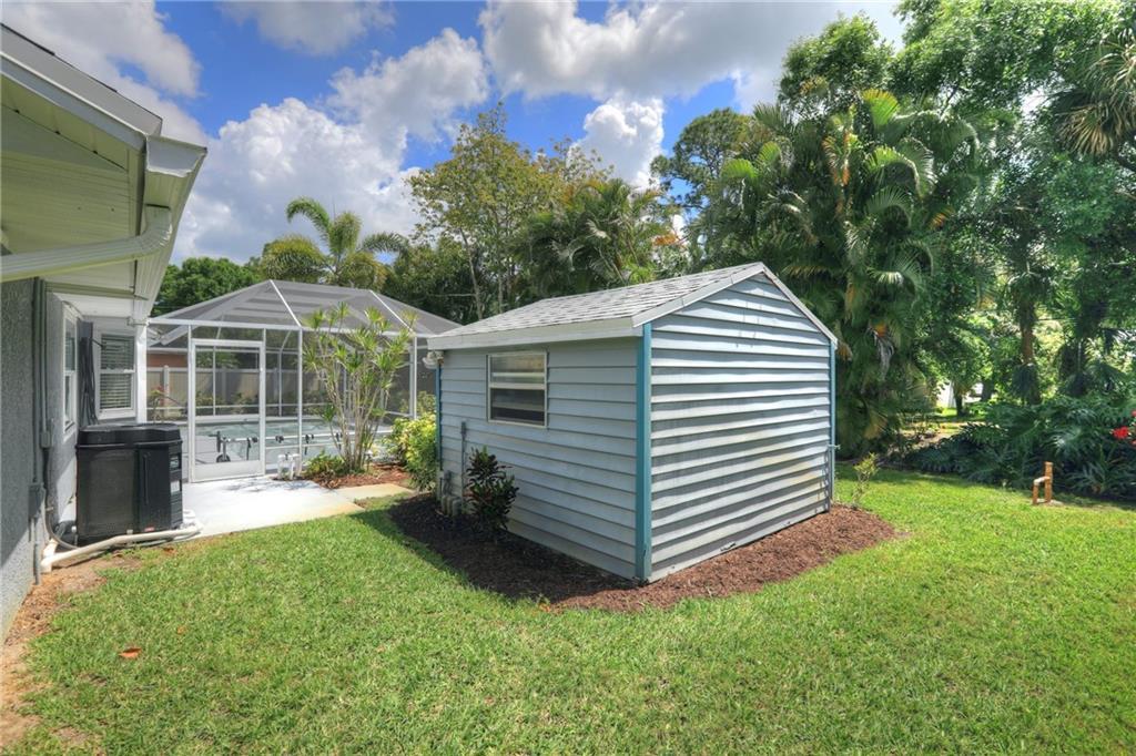 562 Rolling Hill Drive Sebastian, FL 32958 - Photo 33 of 42 a view of a house with backyard and sitting area