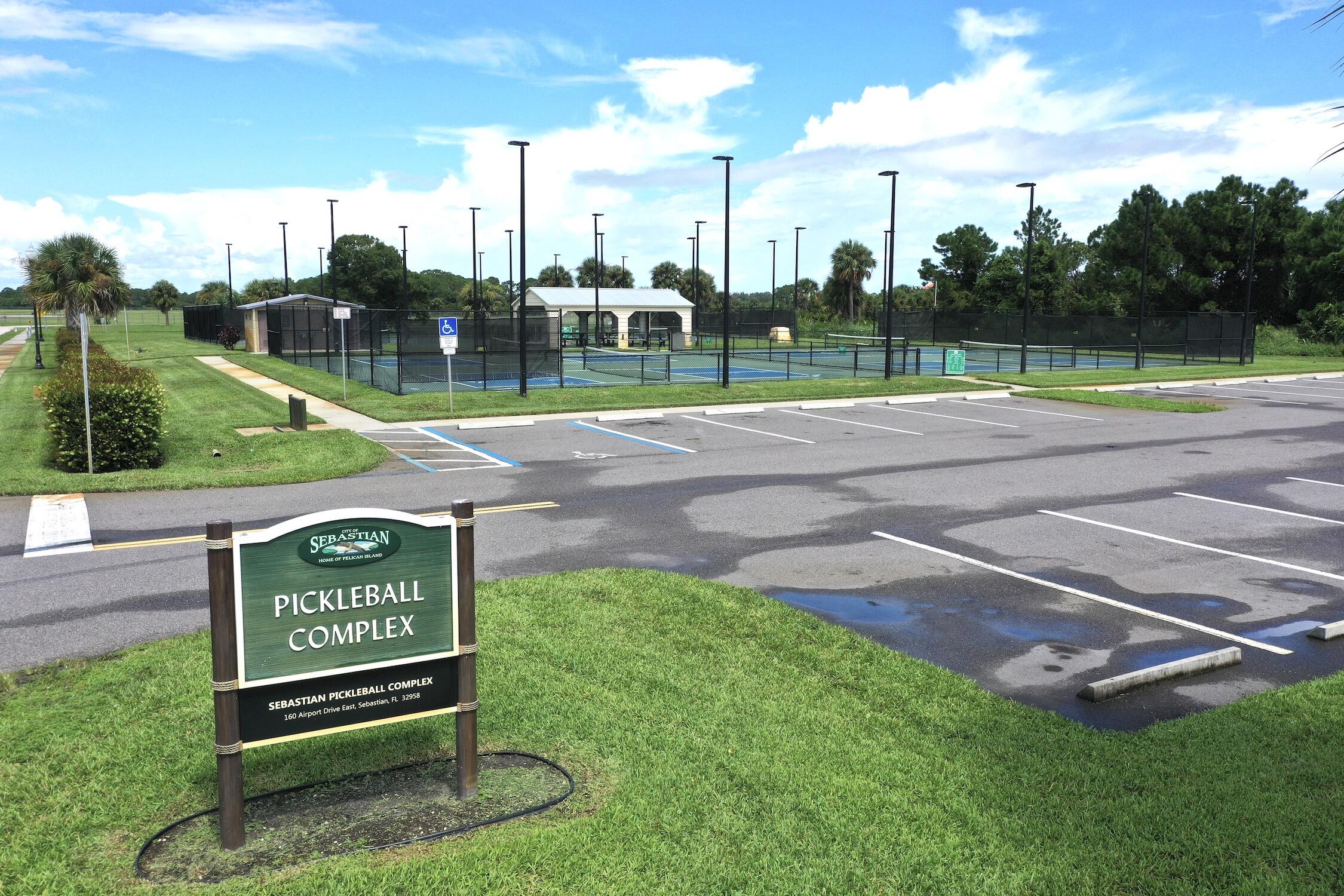 562 Rolling Hill Drive Sebastian, FL 32958 - Photo 36 of 42 a view of a park with a sign board