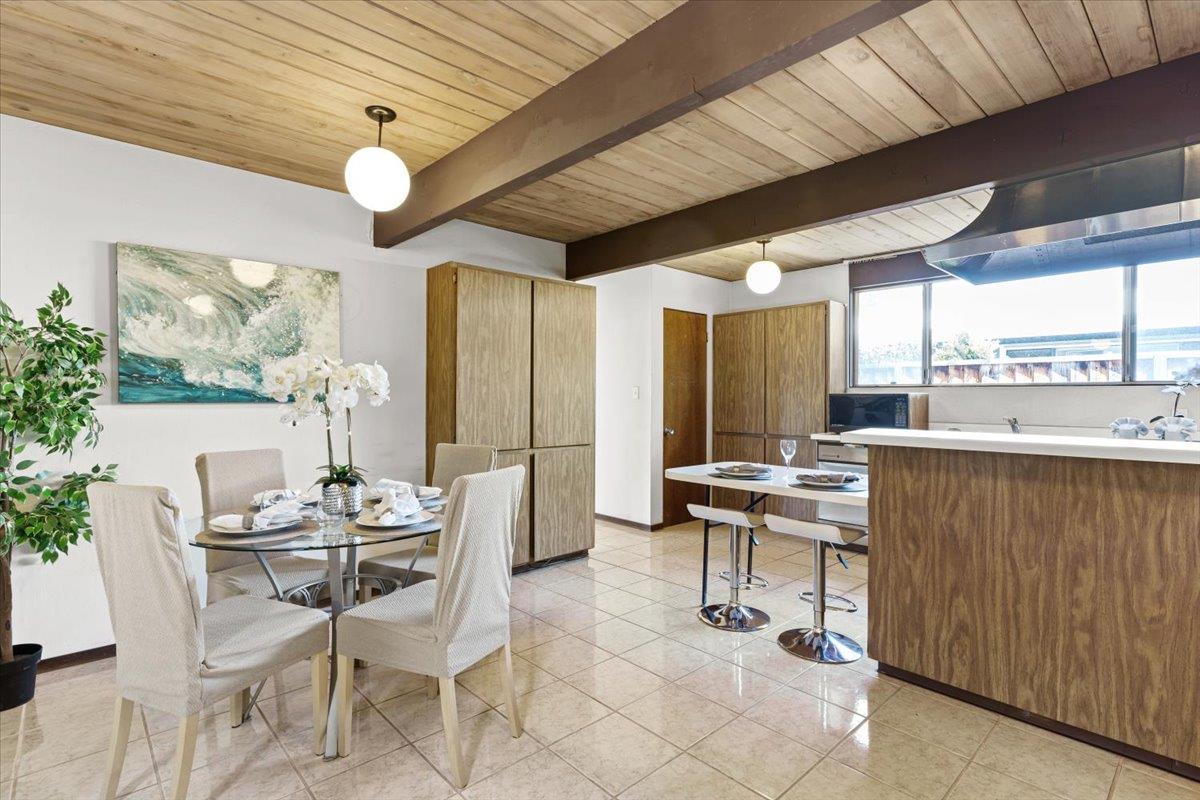 1103 East Homestead Road Sunnyvale, CA 94087 - Photo 14 of 29 a view of a dining room with furniture and window