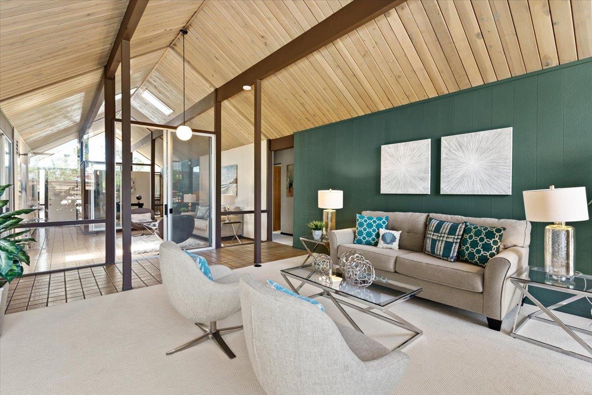 1103 East Homestead Road Sunnyvale, CA 94087 - Photo 2 of 29 a living room with furniture and a lamp