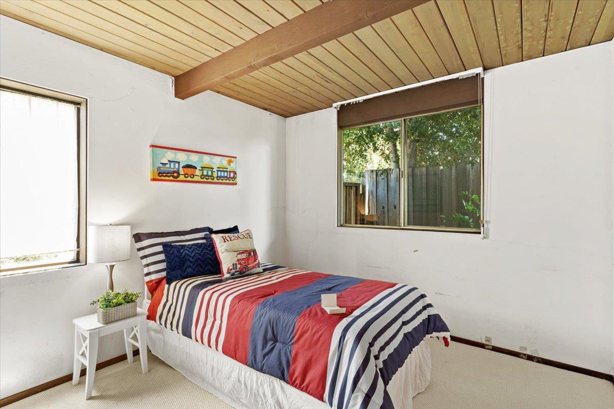 1103 East Homestead Road Sunnyvale, CA 94087 - Photo 22 of 29 a bedroom with a bed and window