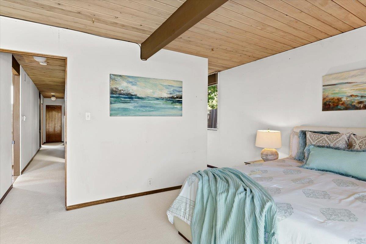 1103 East Homestead Road Sunnyvale, CA 94087 - Photo 23 of 29 a bedroom with a bed and a painting on the wall