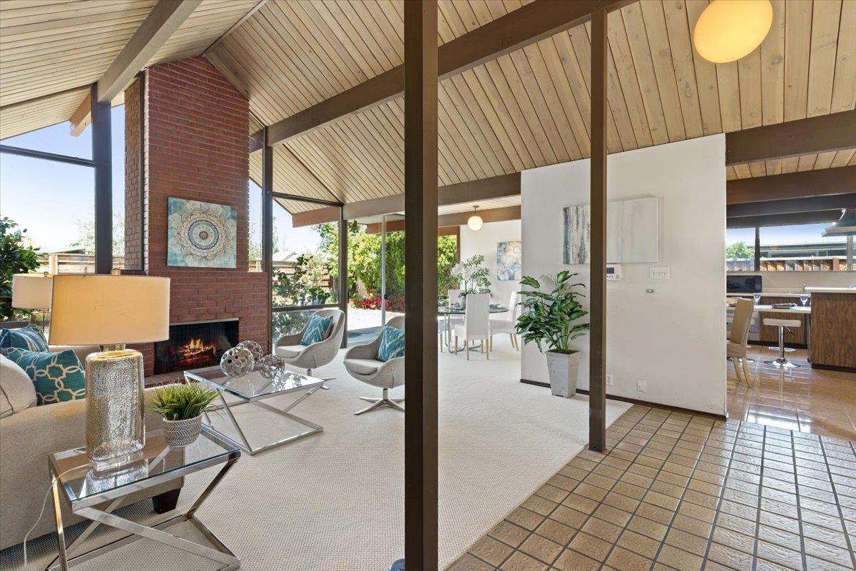 1103 East Homestead Road Sunnyvale, CA 94087 - Photo 3 of 29 a dining room with furniture and a floor to ceiling window