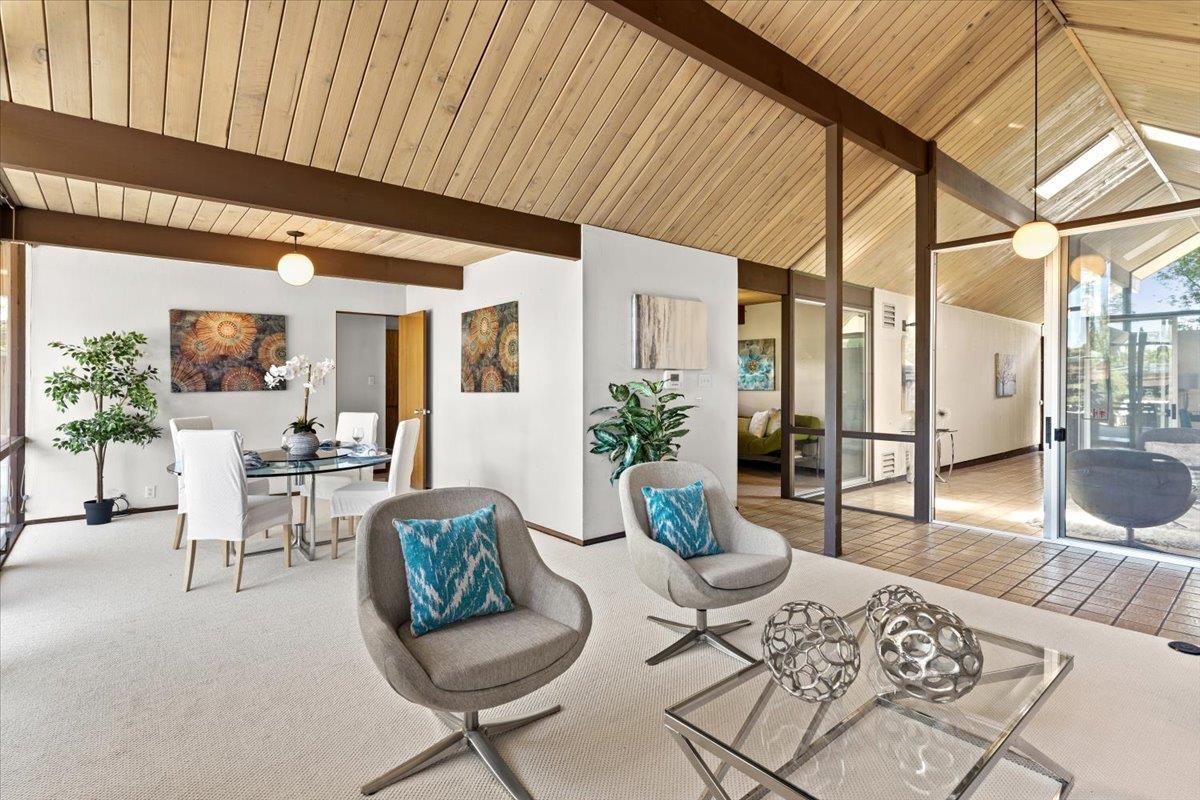 1103 East Homestead Road Sunnyvale, CA 94087 - Photo 4 of 29 a living room with furniture and a table