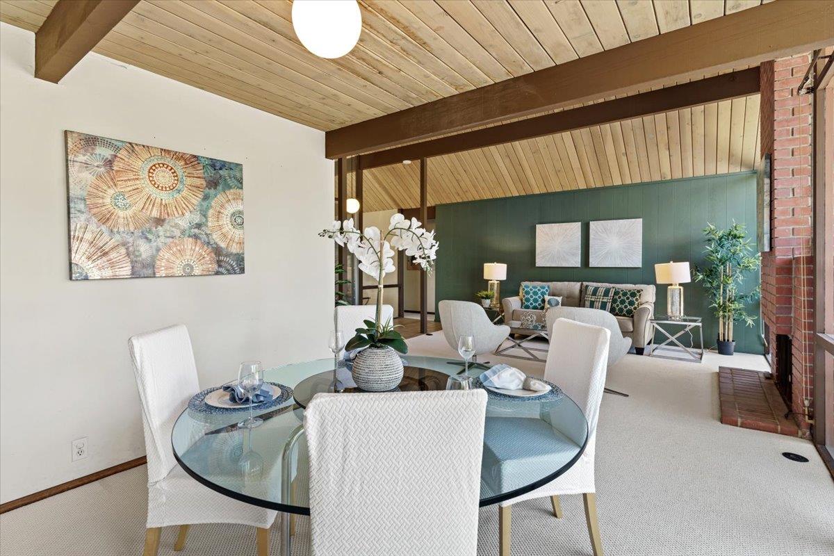 1103 East Homestead Road Sunnyvale, CA 94087 - Photo 5 of 29 a living room with furniture and a large window