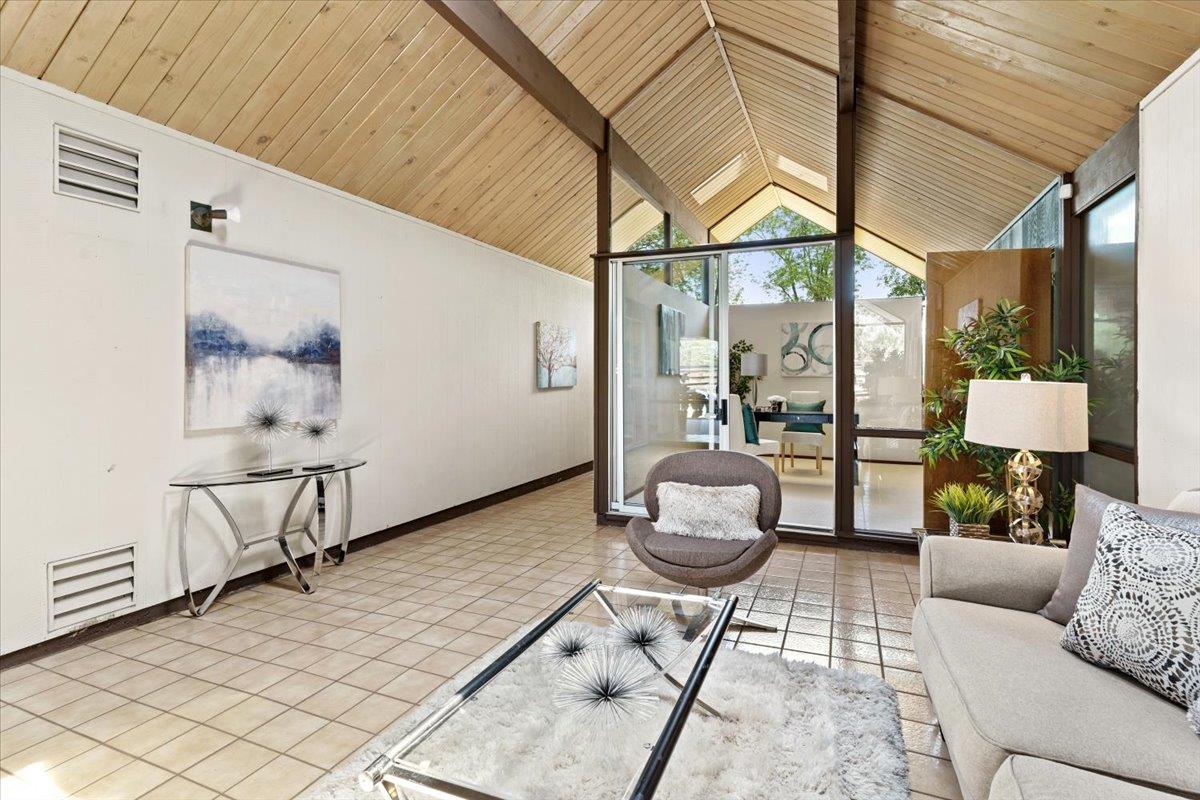 1103 East Homestead Road Sunnyvale, CA 94087 - Photo 10 of 29 a living room with furniture and a potted plant