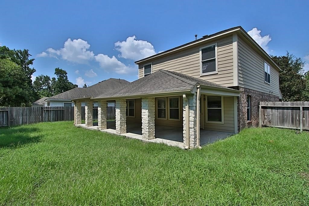 28511 Cory Terrace Court Spring, TX 77386 - Photo 29 of 31 a front view of a house with a yard