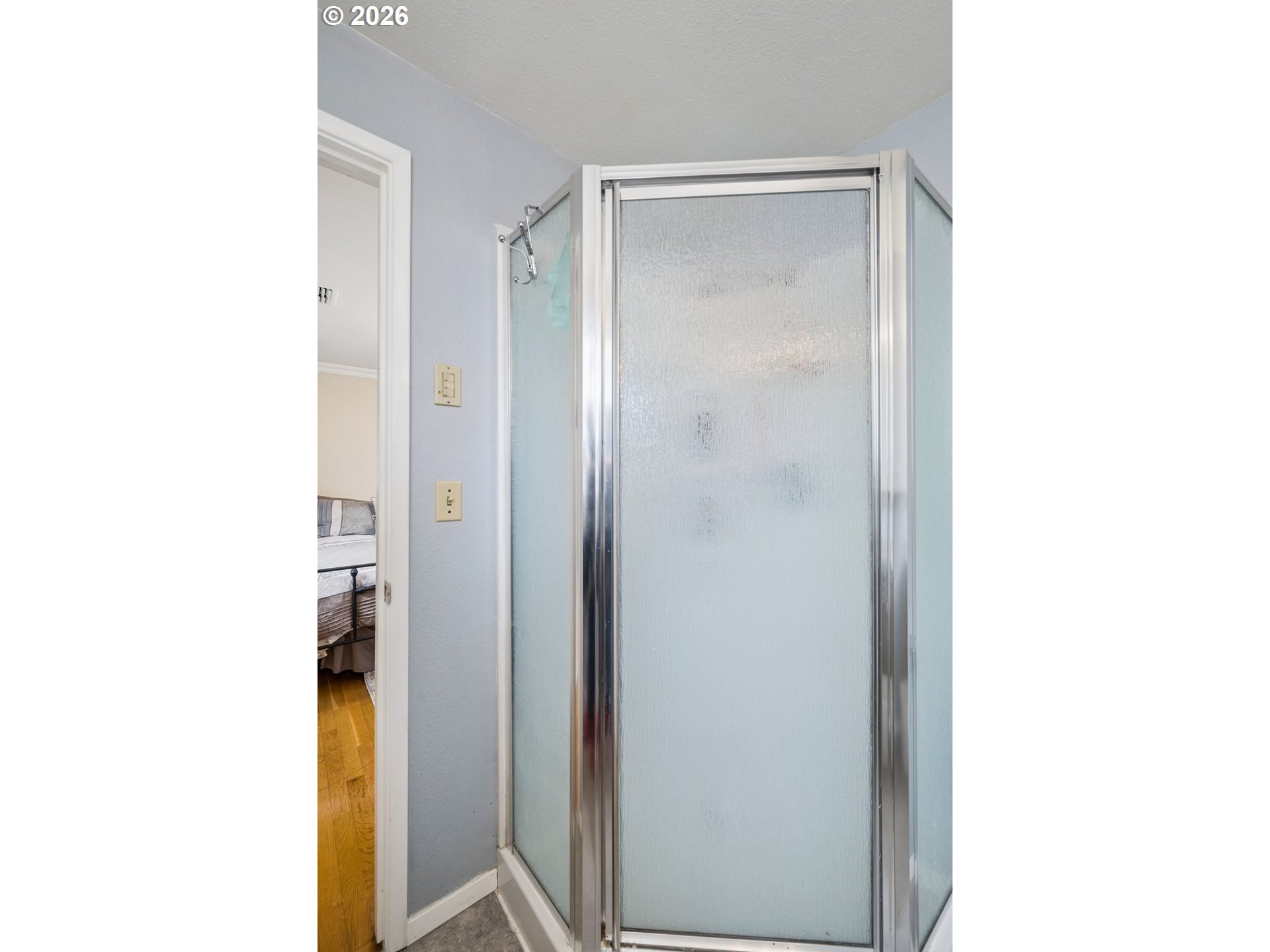 420 Riverview Boulevard Springfield, OR 97477 - Photo 15 of 28 a bathroom with a glass shower door
