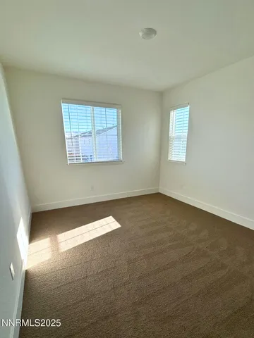 en empty room with windows