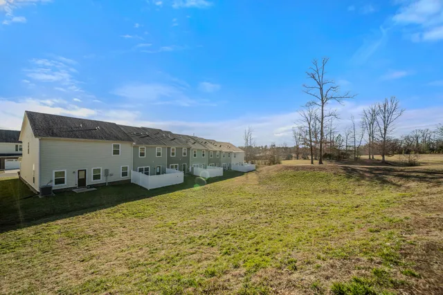 a view of swimming pool with outdoor seating
