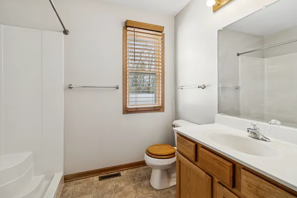 a bathroom with a sink and a toilet