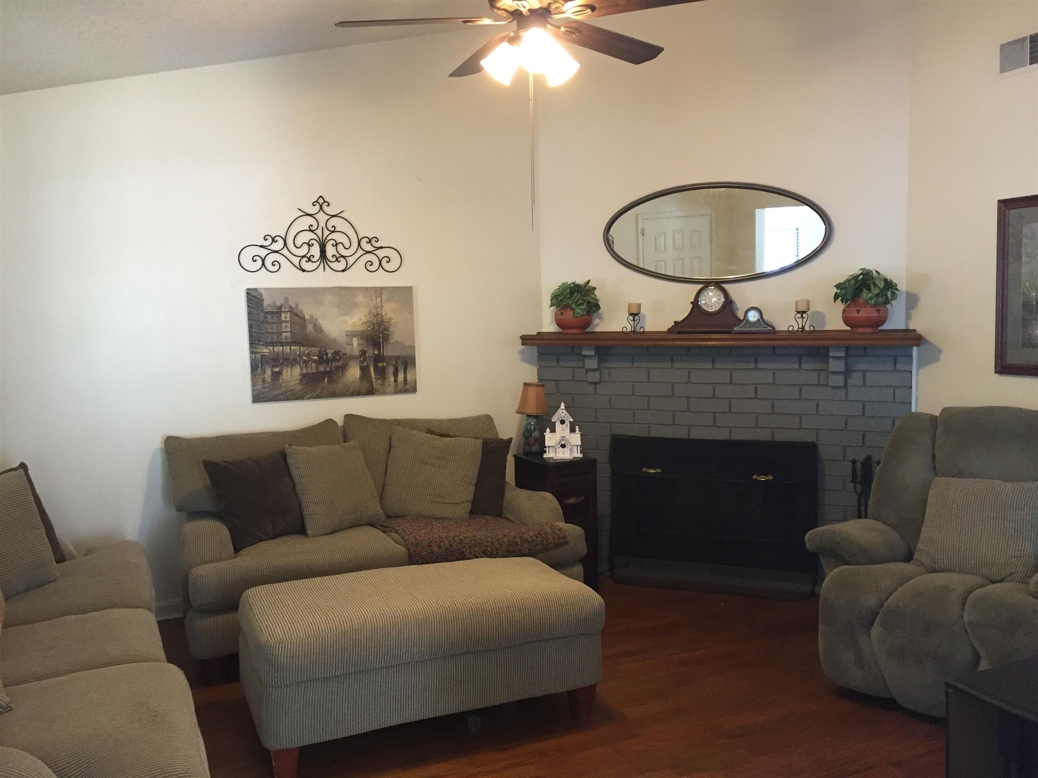 3227 Anderson Road Antioch, TN 37013 - Photo 3 of 16 a living room with furniture and a fireplace