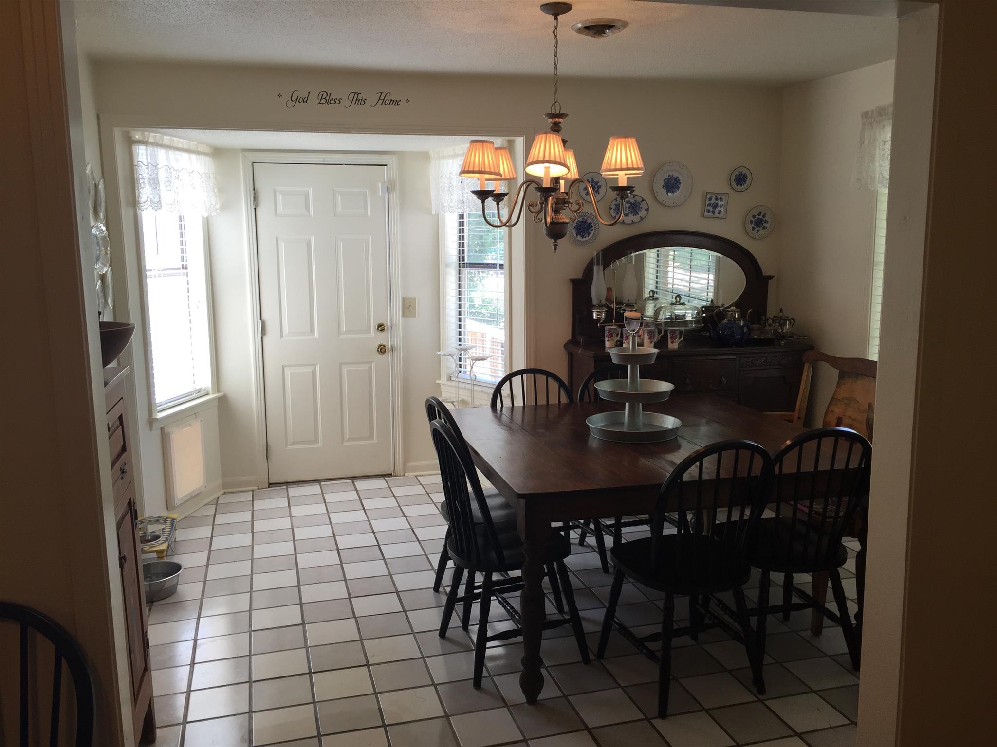 3227 Anderson Road Antioch, TN 37013 - Photo 5 of 16 a view of a dining room with furniture and chandelier