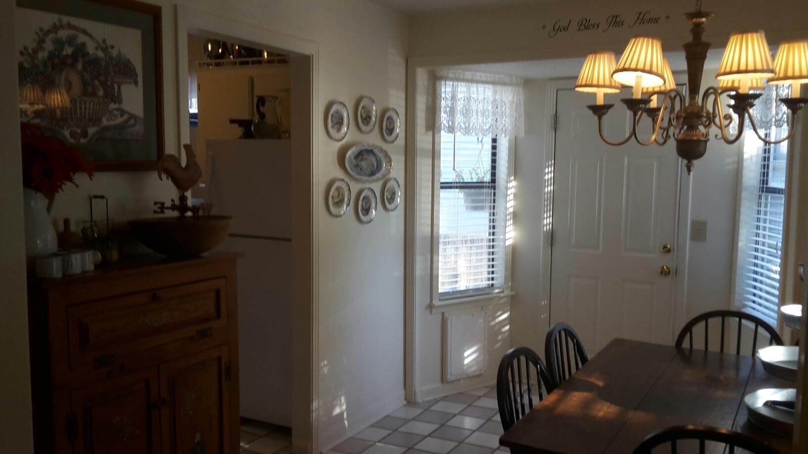 3227 Anderson Road Antioch, TN 37013 - Photo 8 of 16 a dining room with furniture and chandelier
