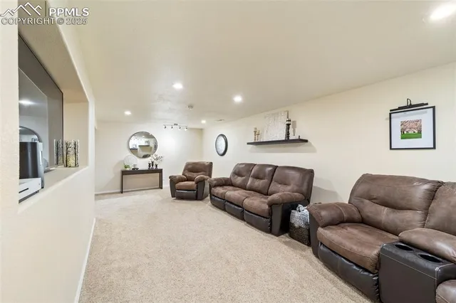 a living room with furniture and a couch