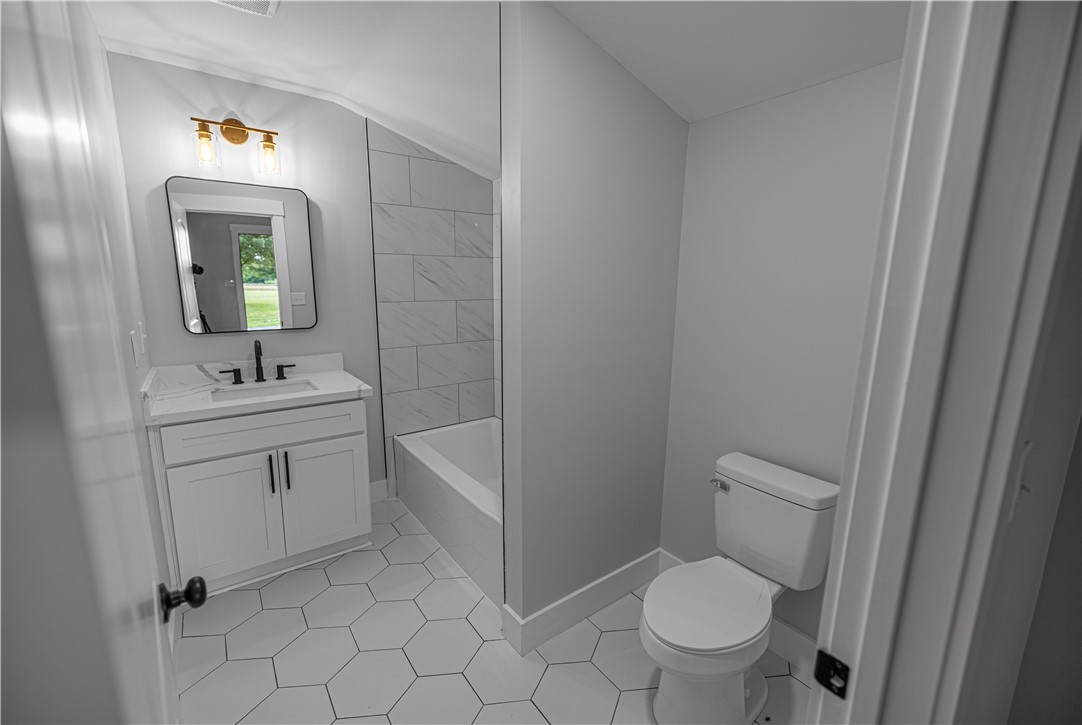 2817 Broadway Lake Road Anderson, SC 29621 - Photo 12 of 41 A pristine bathroom featuring a sleek vanity, contemporary fixtures, and a clean, modern aesthetic.