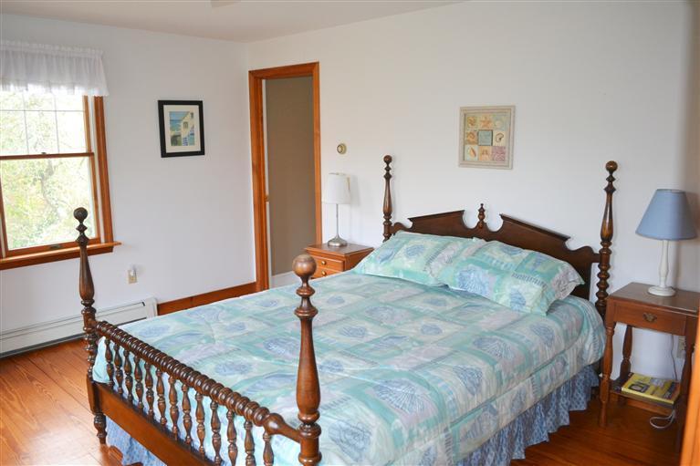 460 Summit Avenue Eastham, MA 02642 - Photo 16 of 25 a bedroom with a bed and a window