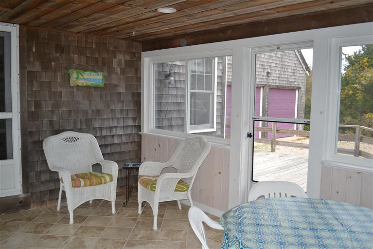 460 Summit Avenue Eastham, MA 02642 - Photo 20 of 25 a living room with furniture and a window