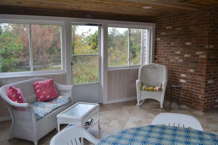 460 Summit Avenue Eastham, MA 02642 - Photo 2 of 25 a living room with furniture and a window