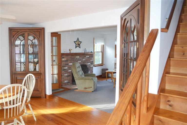 460 Summit Avenue Eastham, MA 02642 - Photo 5 of 25 a living room with furniture and a fireplace