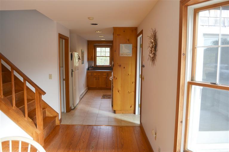 460 Summit Avenue Eastham, MA 02642 - Photo 9 of 25 a view of hallway with wooden floor and stairs