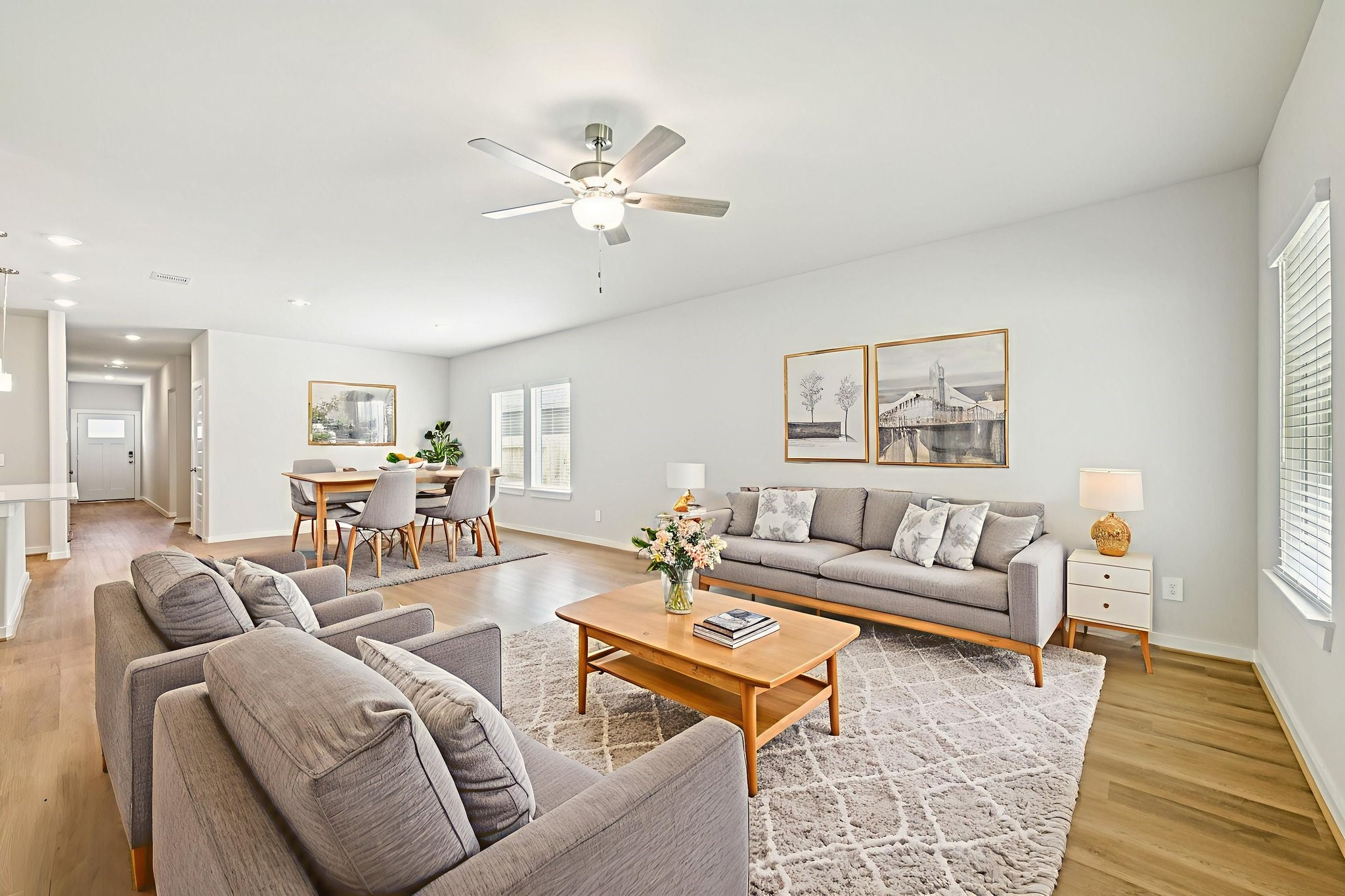 1668 Hopson Ranch Drive Conroe, TX 77301 - Photo 13 of 38 a living room with furniture and wooden floor