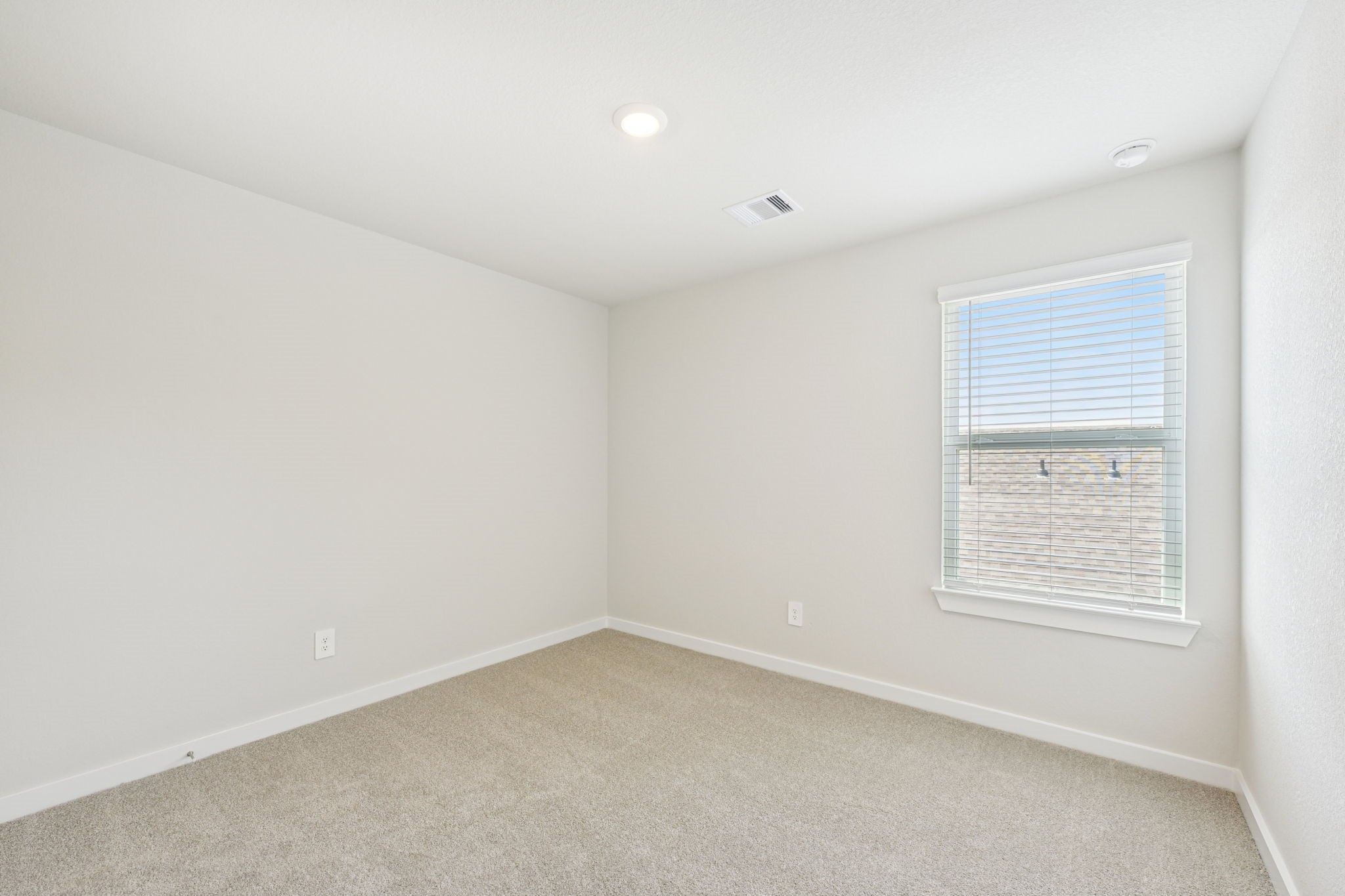 1668 Hopson Ranch Drive Conroe, TX 77301 - Photo 29 of 38 an empty room with a window