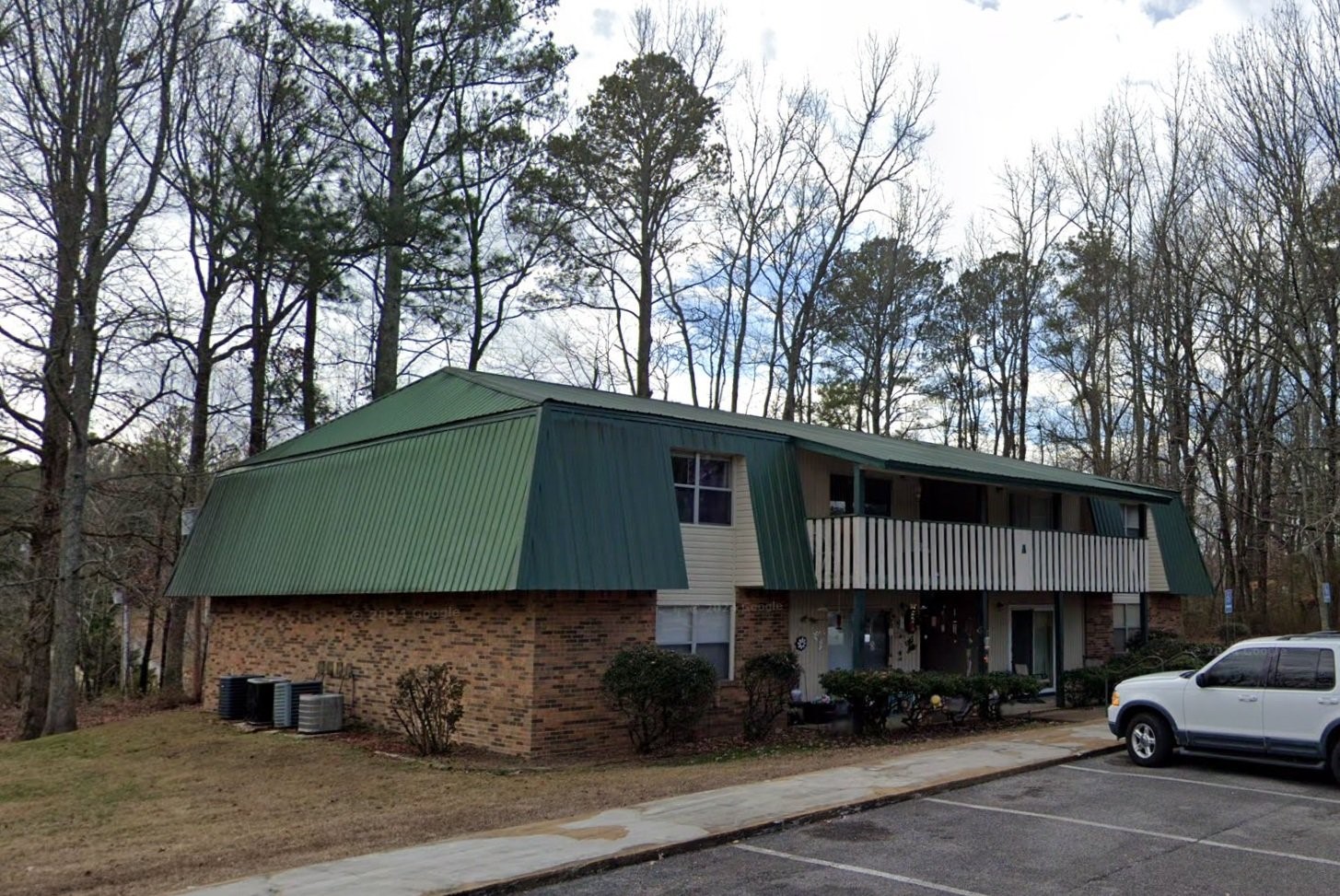 101 Suncrest Drive Grant, AL 35747 - Photo 3 of 6 a front view of a house with cars parked