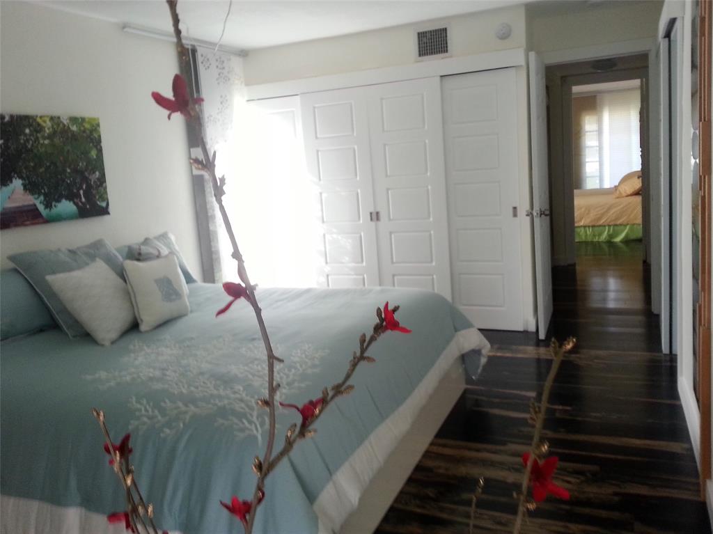 7108 Northwest 66th Street Tamarac, FL 33321 - Photo 15 of 23 a living room with furniture and wooden floor