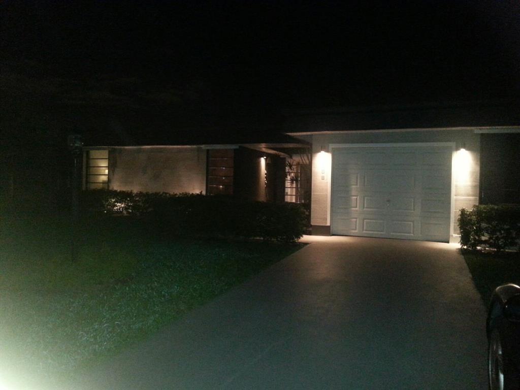 7108 Northwest 66th Street Tamarac, FL 33321 - Photo 18 of 23 a view of an empty room with a fireplace