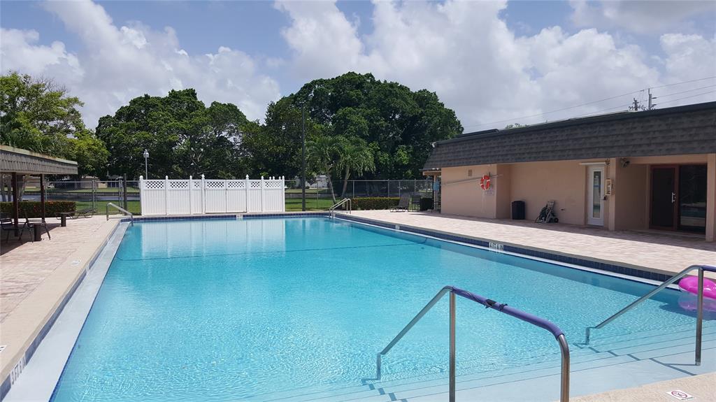 7108 Northwest 66th Street Tamarac, FL 33321 - Photo 23 of 23 a view of a swimming pool with a patio