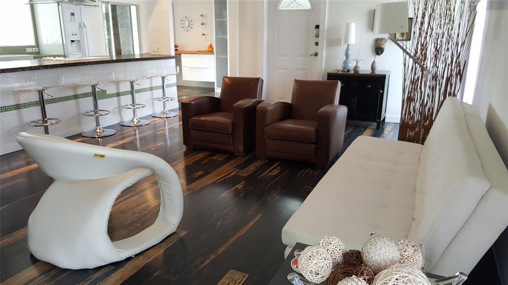 7108 Northwest 66th Street Tamarac, FL 33321 - Photo 7 of 23 a living room with furniture and a fireplace