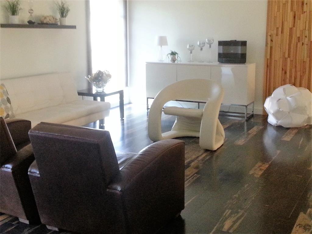 7108 Northwest 66th Street Tamarac, FL 33321 - Photo 9 of 23 a living room with furniture and a flat screen tv