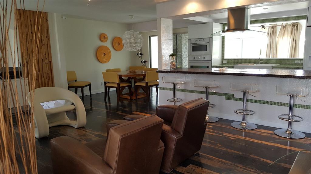 7108 Northwest 66th Street Tamarac, FL 33321 - Photo 10 of 23 a living room with furniture and a large window