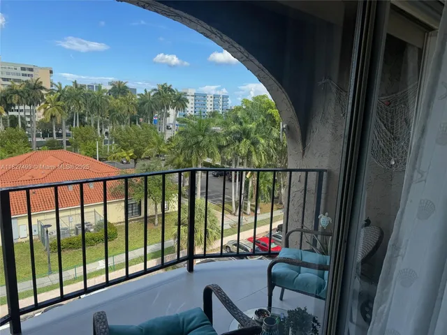 a view of a balcony with an outdoor space
