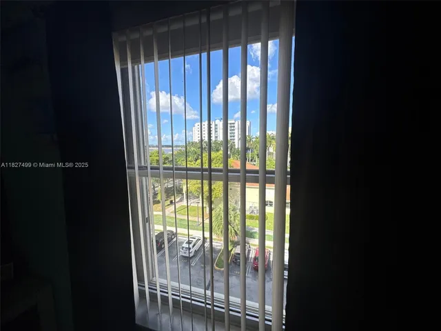 a view of a hallway with closet