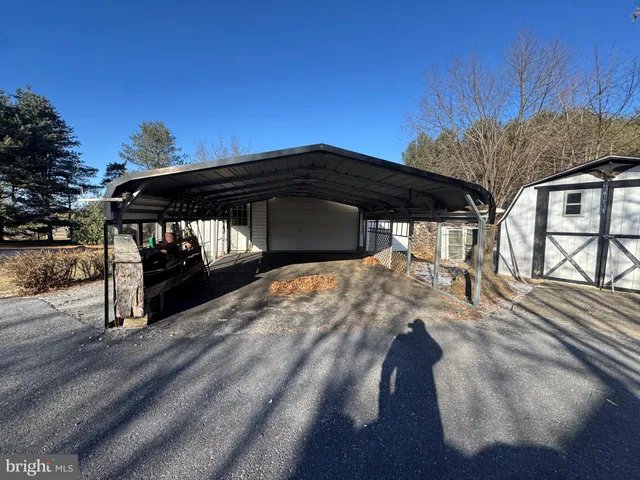 a view of a backyard with a patio